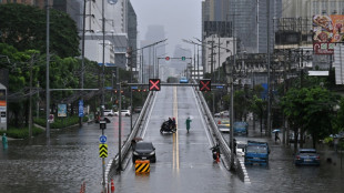 Canals full, roads submerged as Bangkok declares flood disaster 