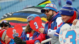 Bills win NFL return amid tributes for hospitalized Hamlin 