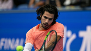 Alcaraz fends off Arnaldi to reach Japan Open quarters