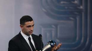 Argentina goalie auctions World Cup gloves for $45K for cancer hospital