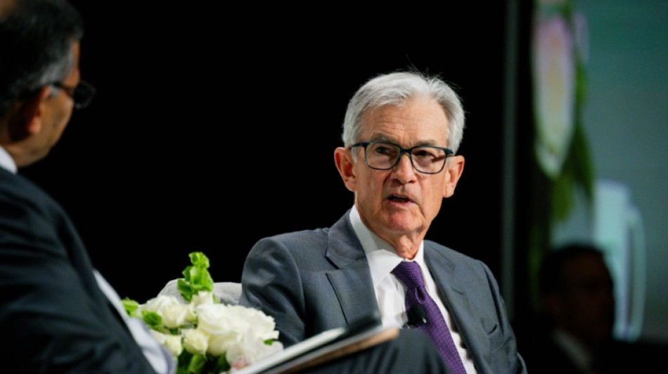 US stocks fall with dollar as Powell warns on tariffs