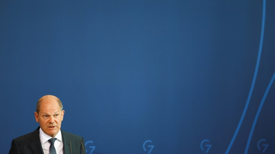 Taciturn Scholz under fire for hesitant Ukraine stance