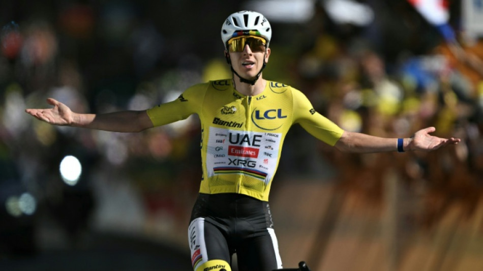 Pogacar breaks Alpe d'Huez record to extend Tour de France lead