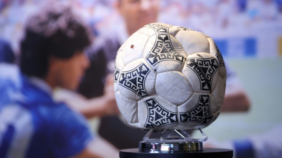 Maradona 'Hand of God' ball fetches &pound;2 million at auction