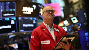 Wall Street cl&ocirc;ture en ordre dispers&eacute;, attend un accord entre Washington et T&eacute;h&eacute;ran