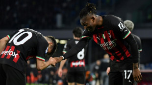 Milan slam brakes on Napoli's title charge with four-goal thumping