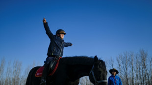 Beijing kids with autism get help from horses