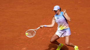 Swiatek says not unbeatable at French Open after winning start