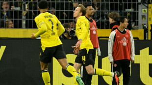Beier late show sends Dortmund top of Bundesliga