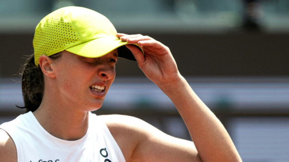 Swiatek's Italian Open title defence ended early by Collins