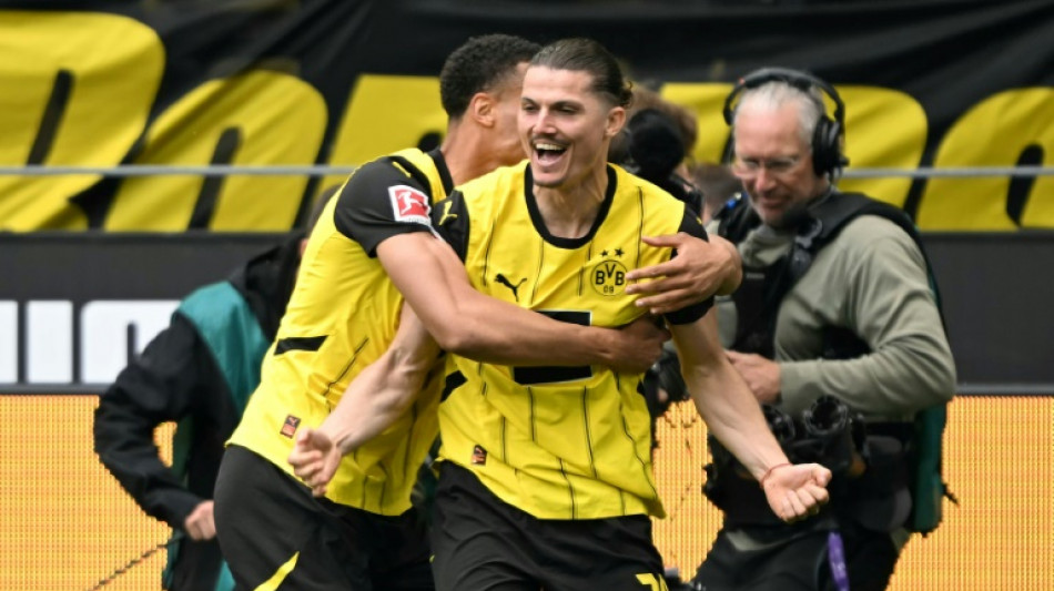 Dortmund complete escape act to snatch top-four berth
