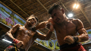 Myanmar traditional boxing packs a punch, kick and headbutt