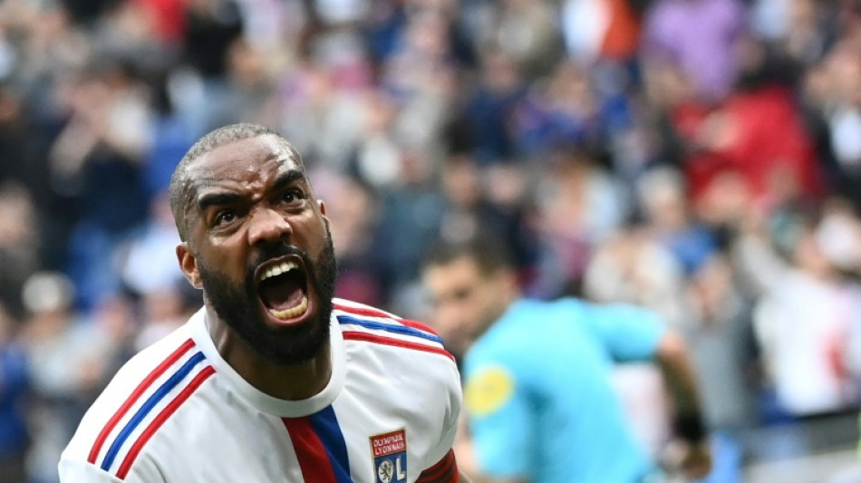Lacazette hits four to inspire Lyon and overtake Mbappe