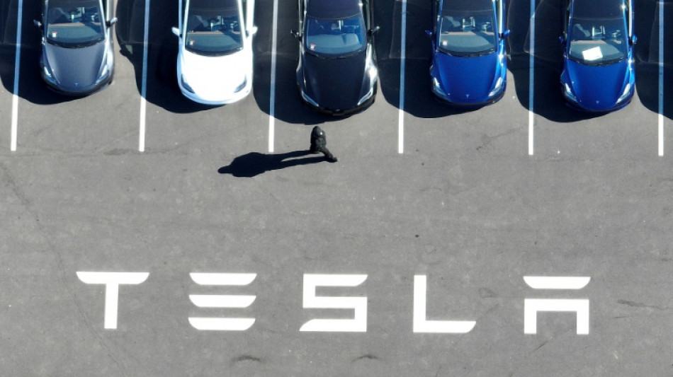 Global stocks mostly rise on trade deal hopes while Tesla plummets