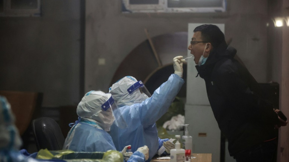 Chine: des millions de personnes confinées face à une flambée de cas record en deux ans