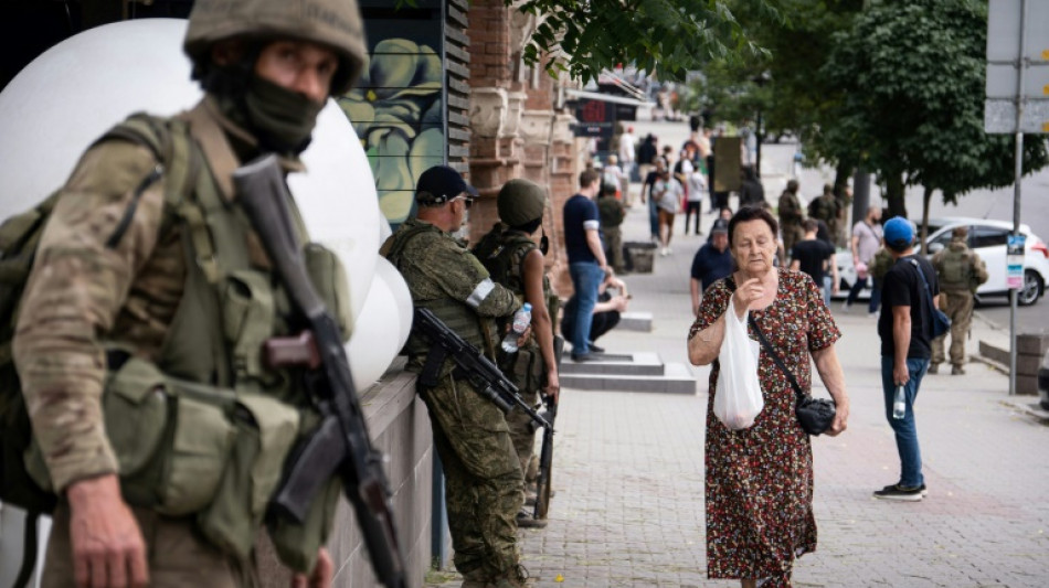 Relief and sympathy as rebels stand down in Russian city