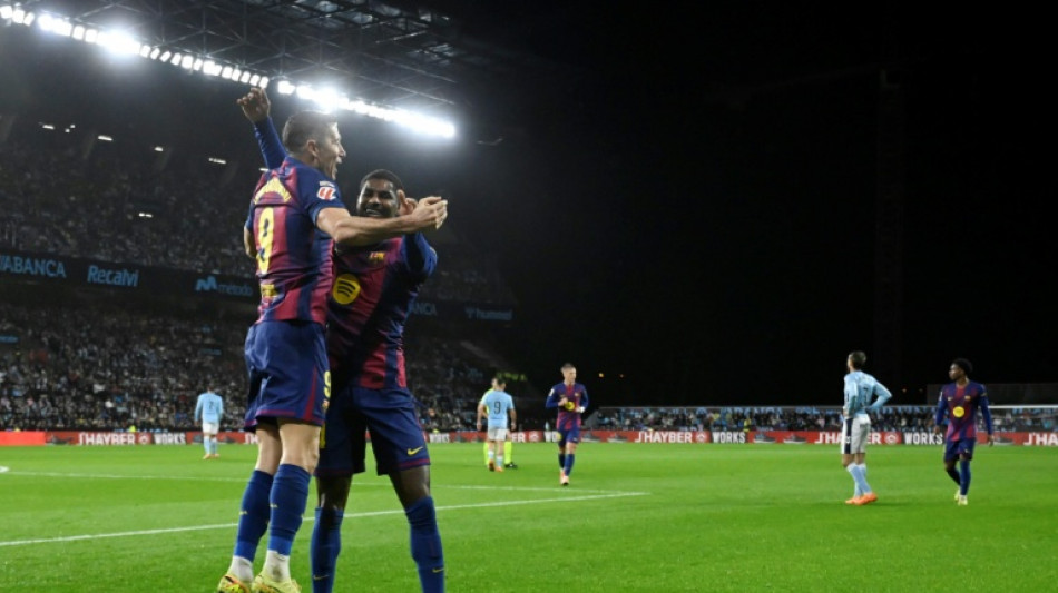 Lewandowski treble helps Barca beat Celta, cut gap on Real Madrid